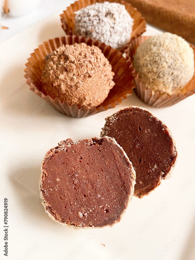 Handmade Chocolate Candies Truffles on White Handmade Chocolate Candies Truffles on White