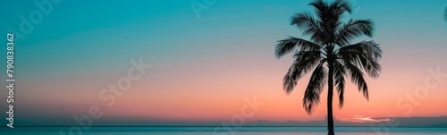 Palm tree that is standing in the water. Summer background. Banner © kramynina