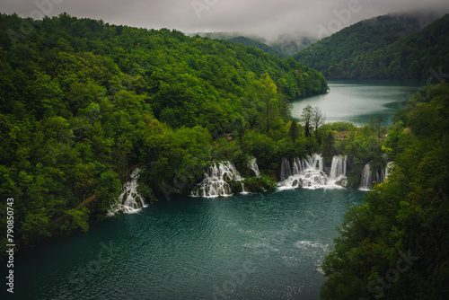Lakes and waterfalls in the misty forest, Plitvice lakes, Croatia