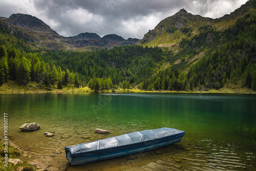 Moored boat on the lake in the mountains, Austria