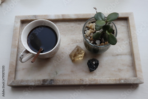 Espresso and flower on marble tray