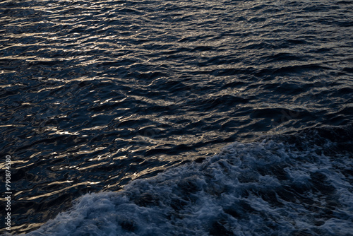 Obraz na płótnie water texture. water reflection texture background. Dark background, High resolution background of dark water or oil surface. Ocean surface dark nature background. River lake rippling Water and waves w salonie