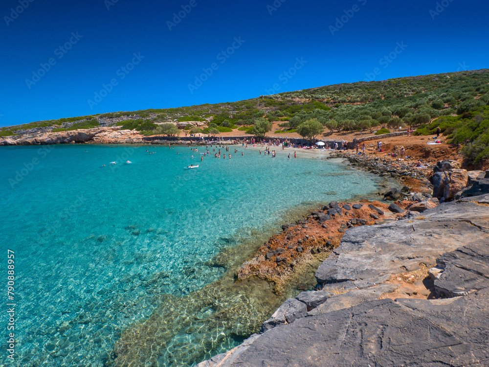 Fototapeta premium Rocky shore with clear water (Kolokitha Beach, Kalydon, Crete, Greece)