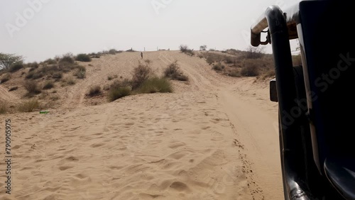 san dunes safari and offloading by motorcar at deserts at day from different angle photo