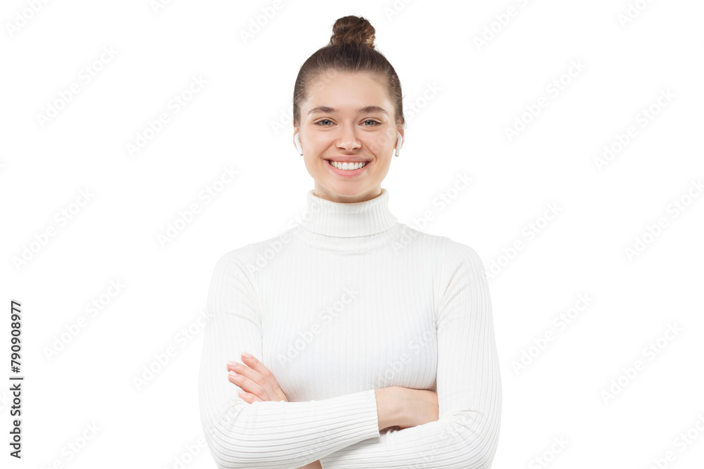 Young girl with hair tied in bun and arms crossed, wearing white sweater, looking at viewer with confident happy smile Young girl with hair tied in bun and arms crossed, wearing white sweater, looking at viewer with confident happy smile