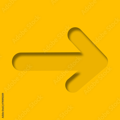Yellow paper cut into holes arrow shape.