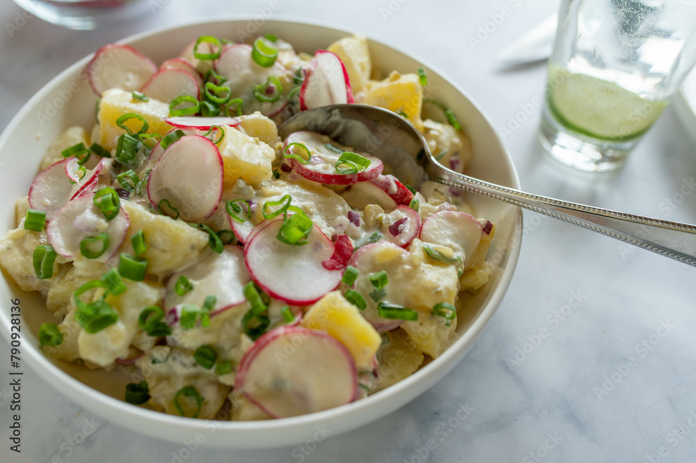 Bowl with healthy potato salad. Low fat and light food for healthy eating Bowl with healthy potato salad. Low fat and light food for healthy eating