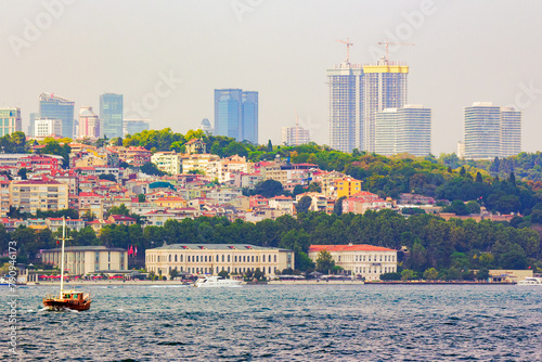istanbul, turkey - 18 aug, 2015: construction of skyscrapers in the center of the old city in progress. architecture development near the shore of bosporus photo