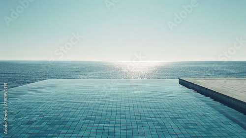 The pool's edge vanishes into the horizon's hazy shimmer photo