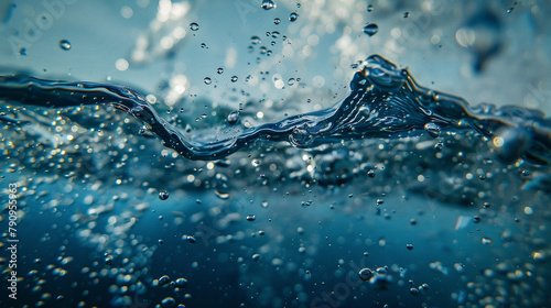 Water droplets scatter in the wake of a graceful dive photo