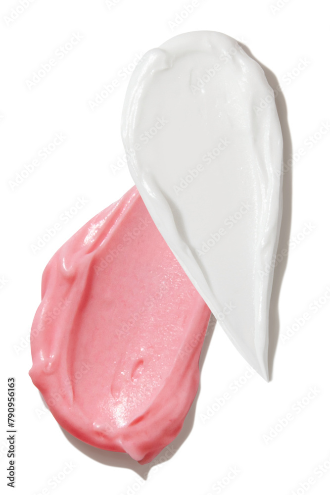 Pink and white cream smears on empty background Pink and white cream smears on empty background