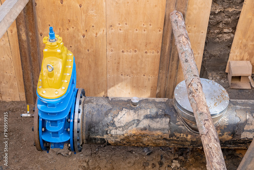 Obraz na plátně A new industrial tap marks the city's infrastructure project, involving the replacement of water and gas systems