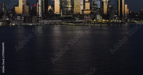 Tilt from Hudson River to Midtown Manhattan with Fading Light of Sunset photo