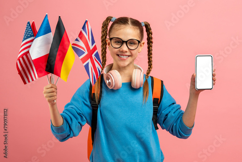 Youth holding flags and showing phone screen photo