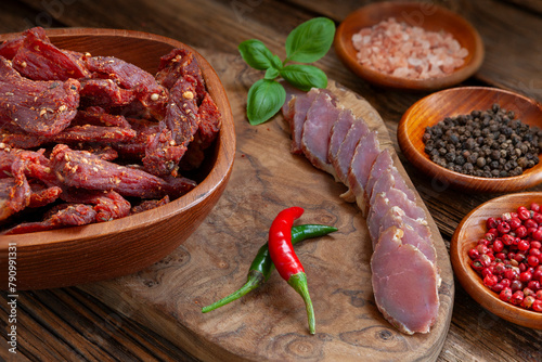 Dry beef meat jerky biltong with hot pepper chilli and spices
