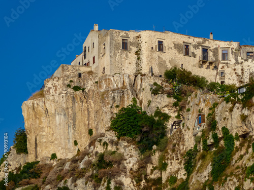 Close up view of the fortress of Peschici along the coast of Puglia, Foggia, Italy, Europe. Vacation in Gargano National Park in the Mediterranean Adriatic Sea. Paradise destination in summer