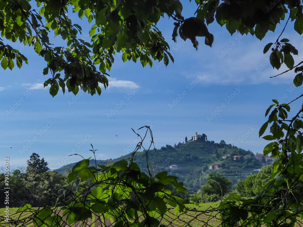 Scenic view of a castle on the hill in Park of Montevecchia and Valle del Curone, Lecco, Lombardy, Italy, Europe. SANTUARIO DI MONTEVECCHIA in Northern Italy. Agritourism in tranquil atmopshere - obrazy, fototapety, plakaty 