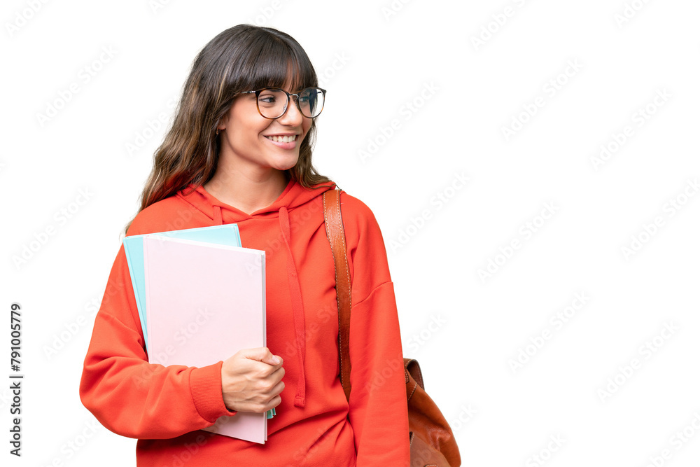 Young student caucasian woman over isolated background looking to the side and smiling Young student caucasian woman over isolated background looking to the side and smiling