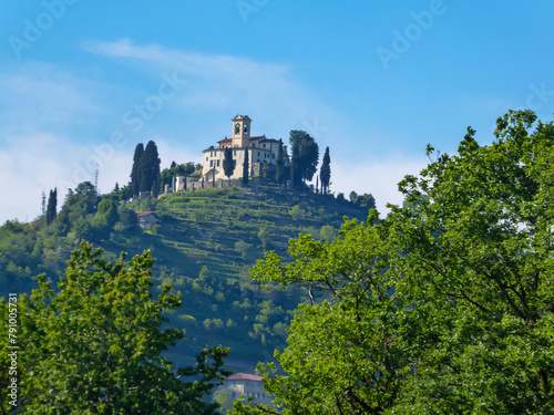 Scenic view of a castle on the hill in Park of Montevecchia and Valle del Curone, Lecco, Lombardy, Italy, Europe. SANTUARIO DI MONTEVECCHIA in Northern Italy. Agritourism in tranquil atmopshere