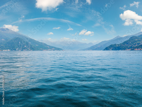 Lake Como (Italy) summer coast hazy view from ship board.