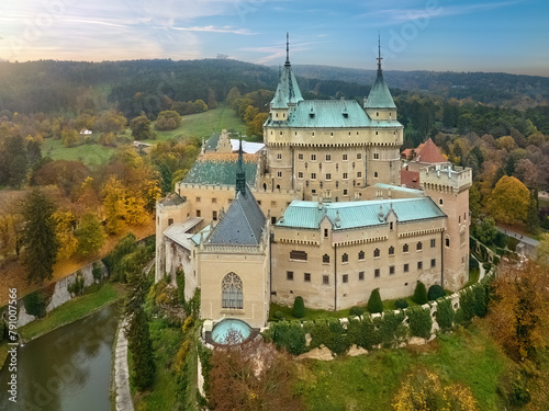 Bojnice Castle, Slovakia. Aerial view of neo-gothic romantic castle in colorful autumn garden and landscape. 