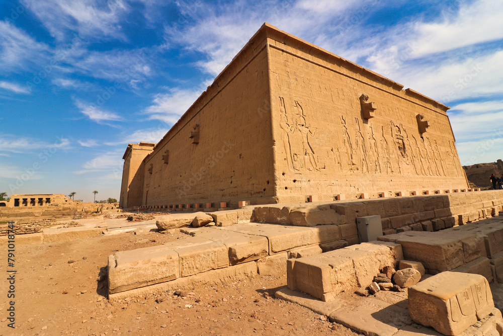 Dendera Temple - Rear view with reliefs of Hathor and Pharoah accepting offerings in the Temple of Hathor at Dendera completed in the Ptolemaic era around 50 BC between Luxor and Abydos towns,Egypt Dendera Temple - Rear view with reliefs of Hathor and Pharoah accepting offerings in the Temple of Hathor at Dendera completed in the Ptolemaic era around 50 BC between Luxor and Abydos towns,Egypt