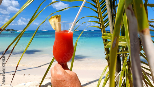 Travel background with drinks Bocal on Caribbean beach.