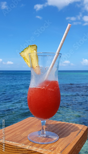 Travel background with drinks Bocal on Caribbean beach.