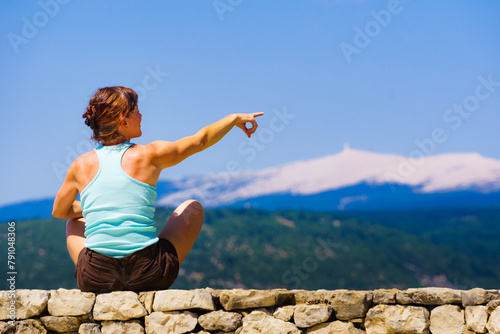 Woman enjoying mountain nature view in France