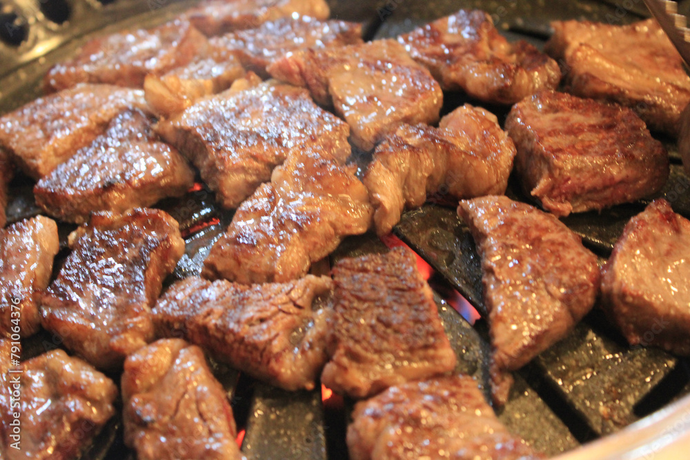 delicious grilled meat on barbecue