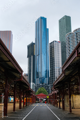 Market Vista: Queen Victoria Market with City Skyscrapers photo