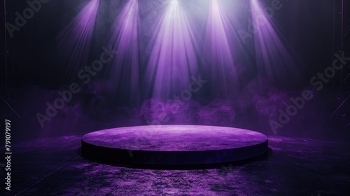 A purple podium stands illuminated by spotlights on a darkened round stage, creating a dramatic scene