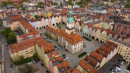 Drone shot showcasing Jelenia Góra's marketplace and historic town hall. © Grzegorz