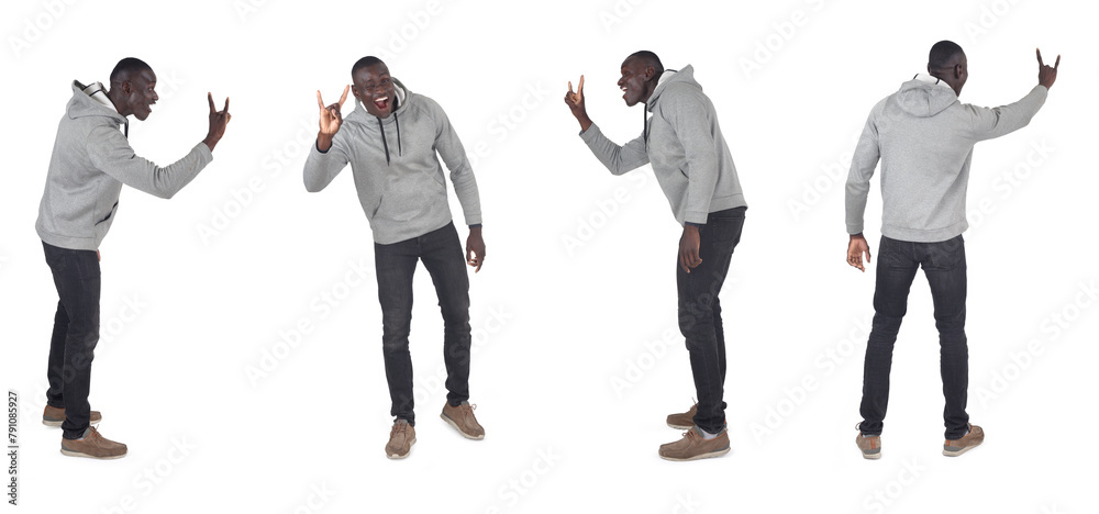 © curto - various poses of same man showing the horns sign with fingers on white background © curto - various poses of same man showing the horns sign with fingers on white background