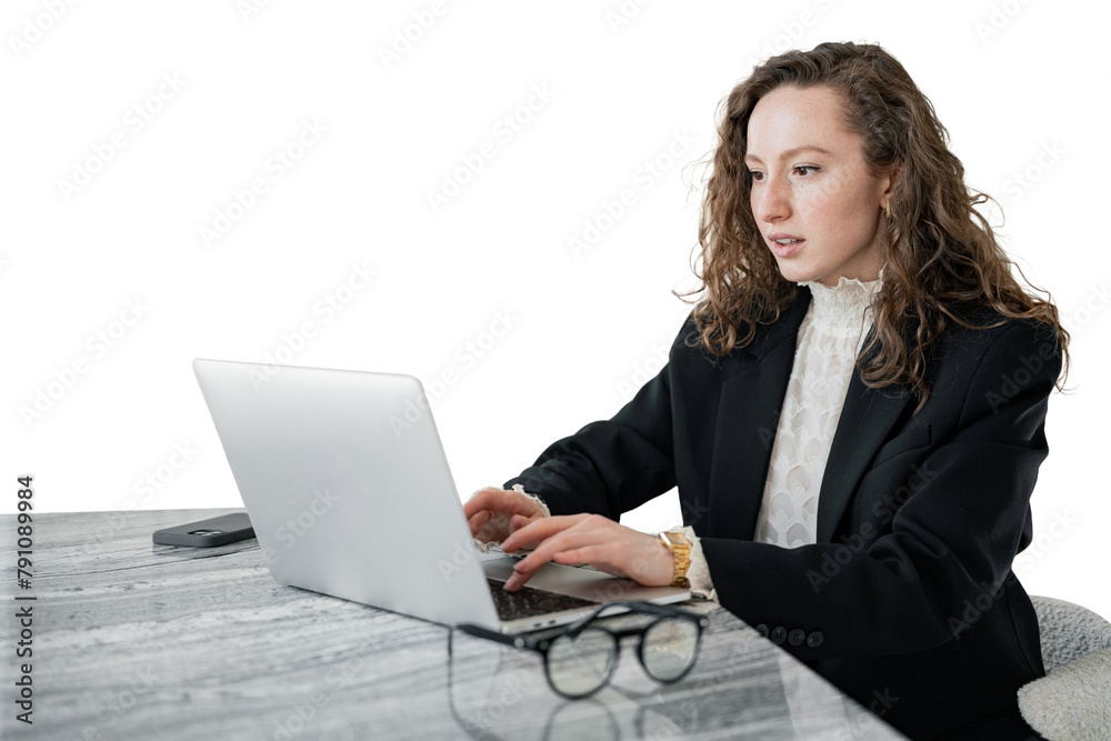 A female business administrator in a jacket uses a laptop computer. Cut out A female business administrator in a jacket uses a laptop computer. Cut out