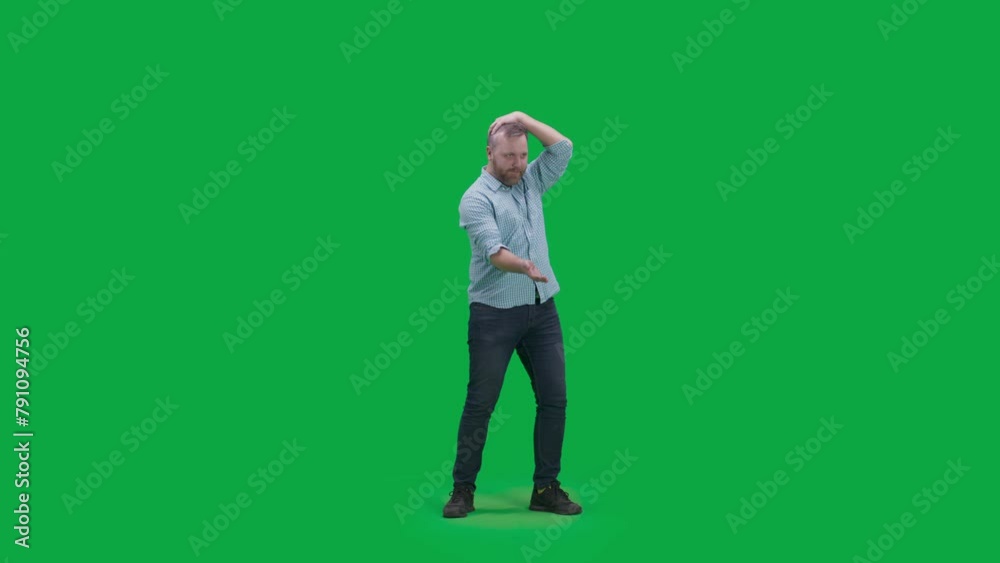 Excited Caucasian man supporting and worrying about football team playing in tournament. Supportive male sports fan gestures and speaks watching soccer match on stadium or in sport bar. Green screen. Excited Caucasian man supporting and worrying about football team playing in tournament. Supportive male sports fan gestures and speaks watching soccer match on stadium or in sport bar. Green screen.