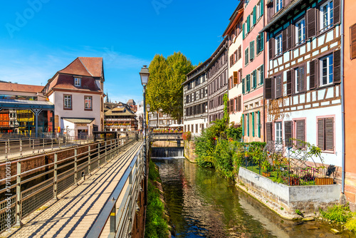 Picturesque half timber, medieval waterfront buildings along the river Ill, in the Petite France district of the Alsatian city of Strasbourg, France.