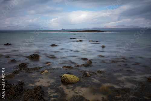 View from Ganavan Sands with the Isle of Mull and the Isle of Lismore in the distance. Oban, Argyll and Bute, Scotland, UK. photo
