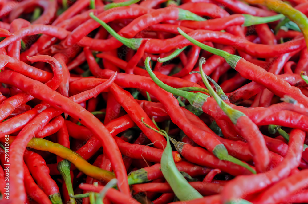 fresh red chilies at the market, nature background