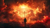 Man in worship in front of the cross in the dramatic cloudy sky with fire