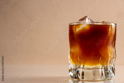 Espresso Tonic, cold drink with espresso and tonic in glass