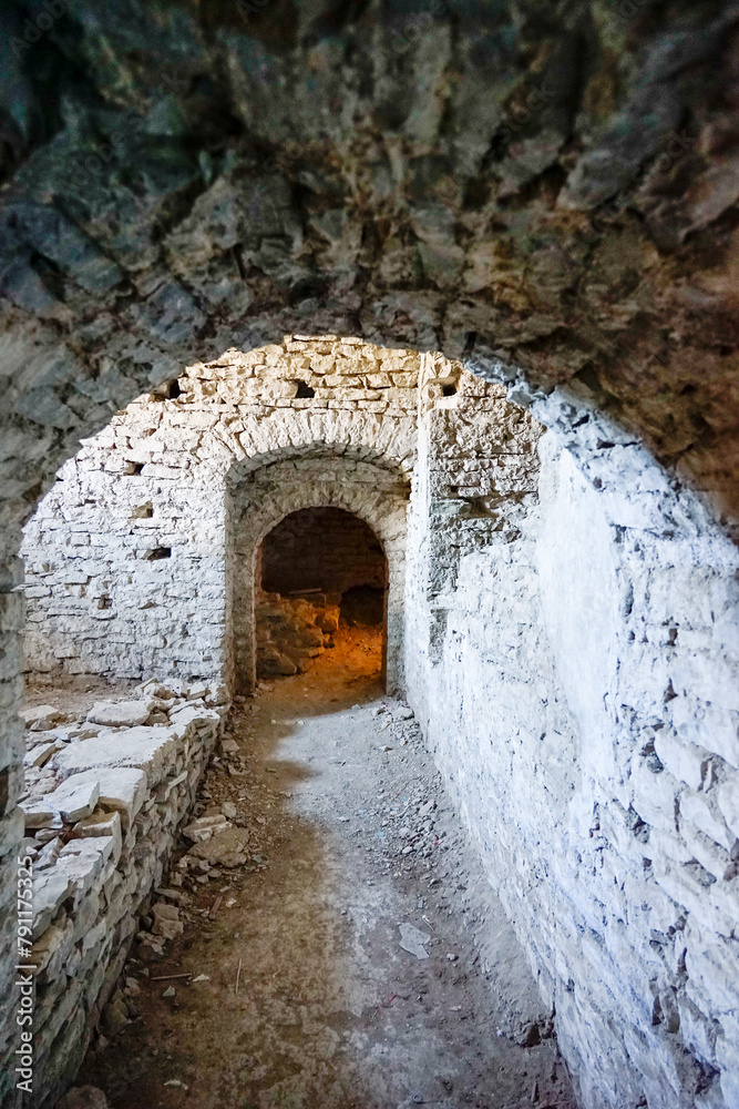 Part of ruins of arch-shaped structure of Ottoman architecture at Gjirokaster castle. Gjirokastner-Albania.