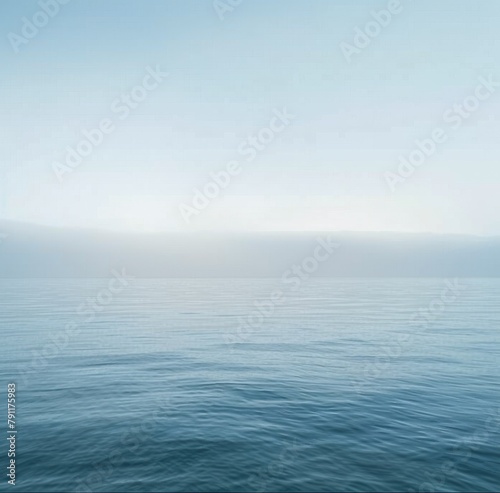 Large Body of Water Under Cloudy Sky
