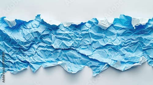 Blue torn tissue paper strips on white background small ripped cigarette paper and wrapping paper top view crimson napkin pieces