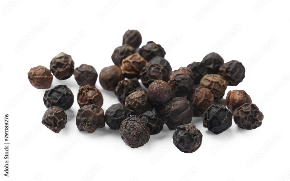Aromatic spice. Many black dry peppercorns isolated on white Aromatic spice. Many black dry peppercorns isolated on white