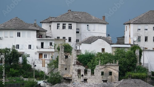 southern Albania. clock tower fortress at Gjirokaster, Albania Ottoman legacy is clearly visible. town huge castle offers panoramic views. streets in the UNESCO listed old town of Gjirokaster photo