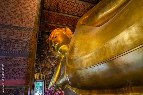 Beautiful gold statue of Reclining Buddha in Wat Pho Temple, Bangkok, Thailand