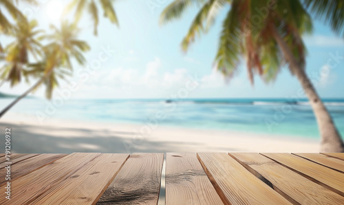 Wooden table top with wooden planks and blurred beach background, palm leaves and blue sky in summer for product display montage