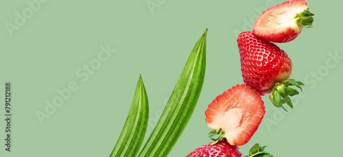 Animation of strawberries and leaves, moving on the green background (ID: 791212188)