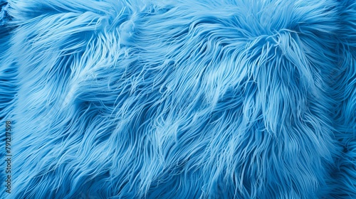 Close-up of a blue fluffy rectangular pillow, with a vintage charm and eco-conscious design, isolated background